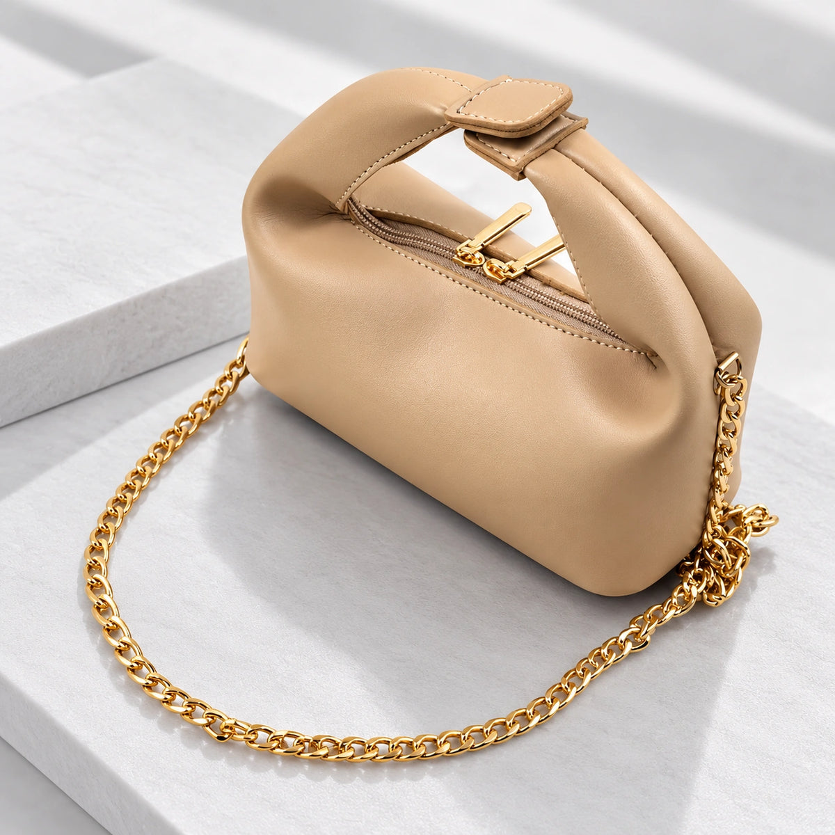 Beige luxury handbag with gold chain strap for women